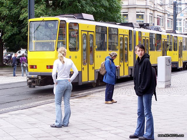 Girls waiting for the tram at Alexanderplatz.