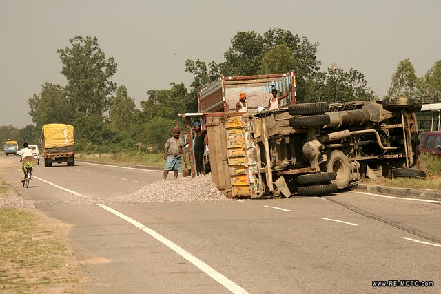 It is frequent to see turned over trucks on the road. In India "driving" is a synonym for "madness". 